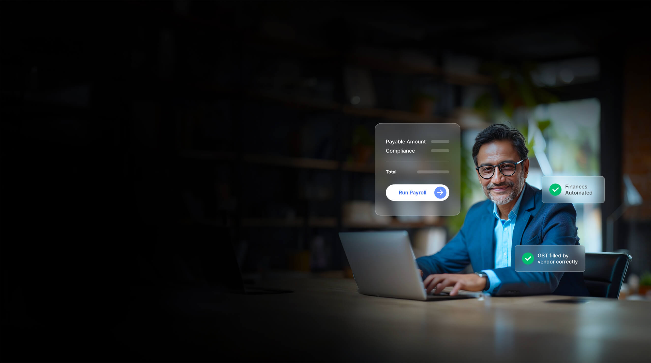 An image of Charted Accountant sitting in his office working on laptop and smiling